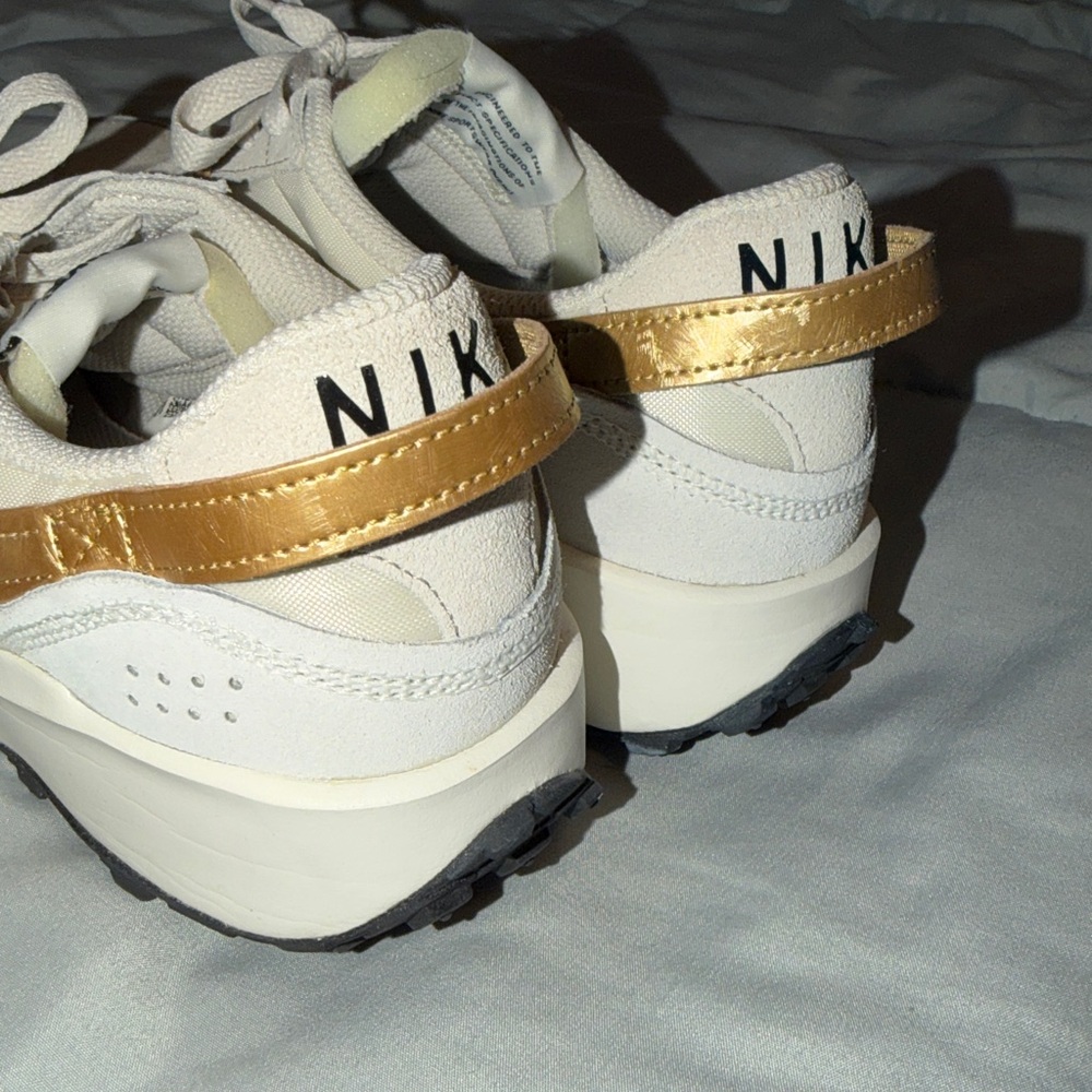 Nike Women’s cream Sneakers with Gold Swoosh Accent - Picture 3 of 4